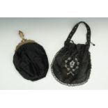 A William IV black velvet purse, its cantle foliate engraved and dated 1837, together with a