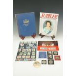 A quantity of Royal commemorative coins and stamps