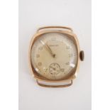 An early 1950s Envoy 9 ct gold wristwatch, having a 17 jewel movement and circular frosted