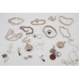 A quantity of largely contemporary silver and white metal (tested as silver) jewellery, 233 g