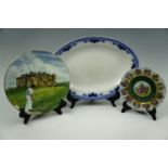 A W.H. Grindley ashet together with a Coalport decorative golf plate and another, ashet 40 cm