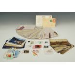 A quantity of international first day stamp covers together with a group of early 20th century and