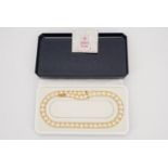 A single strand pearl necklace, having a 9 ct yellow metal clasp, 7 mm, 40 cm