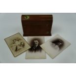 A quantity of Victorian cartes de visite, in a faux leather desk-top case
