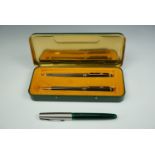 A cased Metal Box Promotional Packaging pen and pencil set together with a Parker Frontier