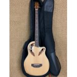A Gear4music acoustic electric bass in a Boston guitar bag