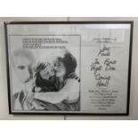 A framed period poster for the film 'Coming Home', 100 x 75 cm