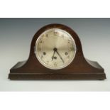 A Comet "Napoleon's hat" oak mantle clock, having a Mauthe movement, circa 1930, 41 x 23 cm