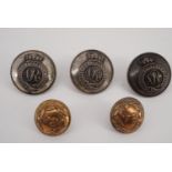 Three Victorian Royal Cumberland Militia officers' tunic buttons together with a pair of 34th