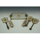 Two dressing table sets