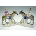 A pair of Victorian Staffordshire flat-back figures modelled as milk maids atop donkeys, 30 cm x