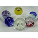 Six Caithness paperweights