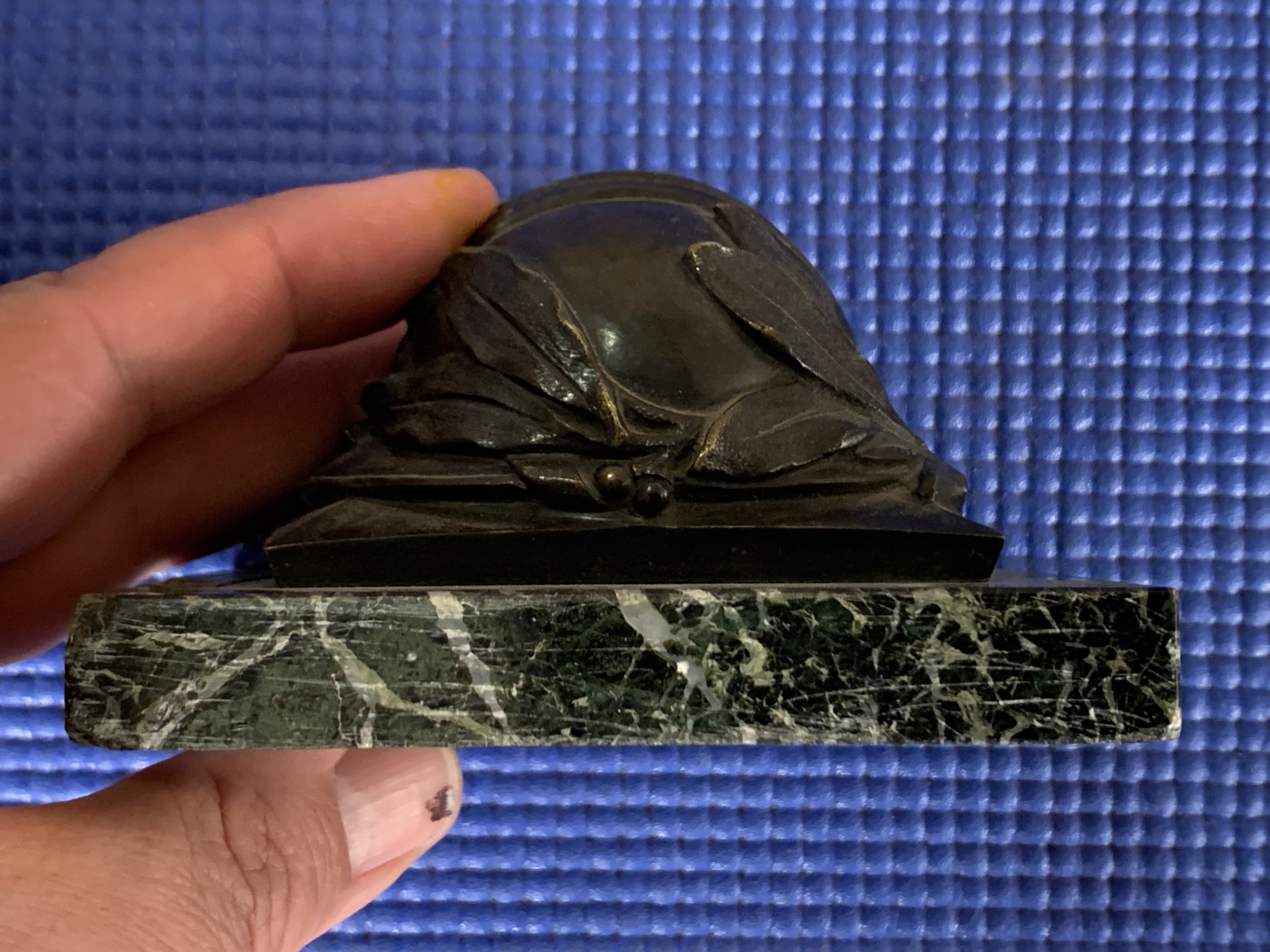 A French Great War commemorative paperweight in the form of a laurel-garlanded Adrian helmet, on a - Image 6 of 7