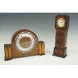 A Smith's presentation mantle clock together with a miniature grandfather clock, tallest 31 cm