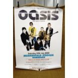 An original poster from a July 2000 Oasis concert at Edinburgh, together with a Manic Street