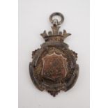 A Great War munitions factory worker's football club silver prize fob medallion, awarded to G D