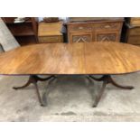 A Regency mahogany two-pillar dining table, (restored)