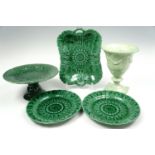 Wedgwood green majolica leaf-moulded plates and a two-handled dish (latter a/f), together with a