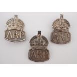 Three Second World War silver ARP badges