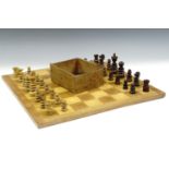 A parquetry chess board (44 cm) together with a boxed late 19th / early 20th Century turned chess