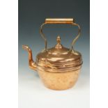 A copper kettle, 28 cm