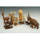 A quantity of carved wood animals, fungi etc, tallest 28 cm
