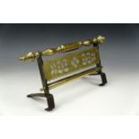 A Victorian range / fire grate hanging trivet in wrought iron and brass, 30 x 20 cm