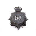 A QEII Metropolitan Police helmet badge