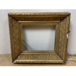 A Victorian heavy gilt picture frame and one other, smaller frame, former 51 cm x 46 cm