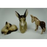 A Midwinter deer faun wall plaque, Beswick Siamese kittens and a Sylvac donkey