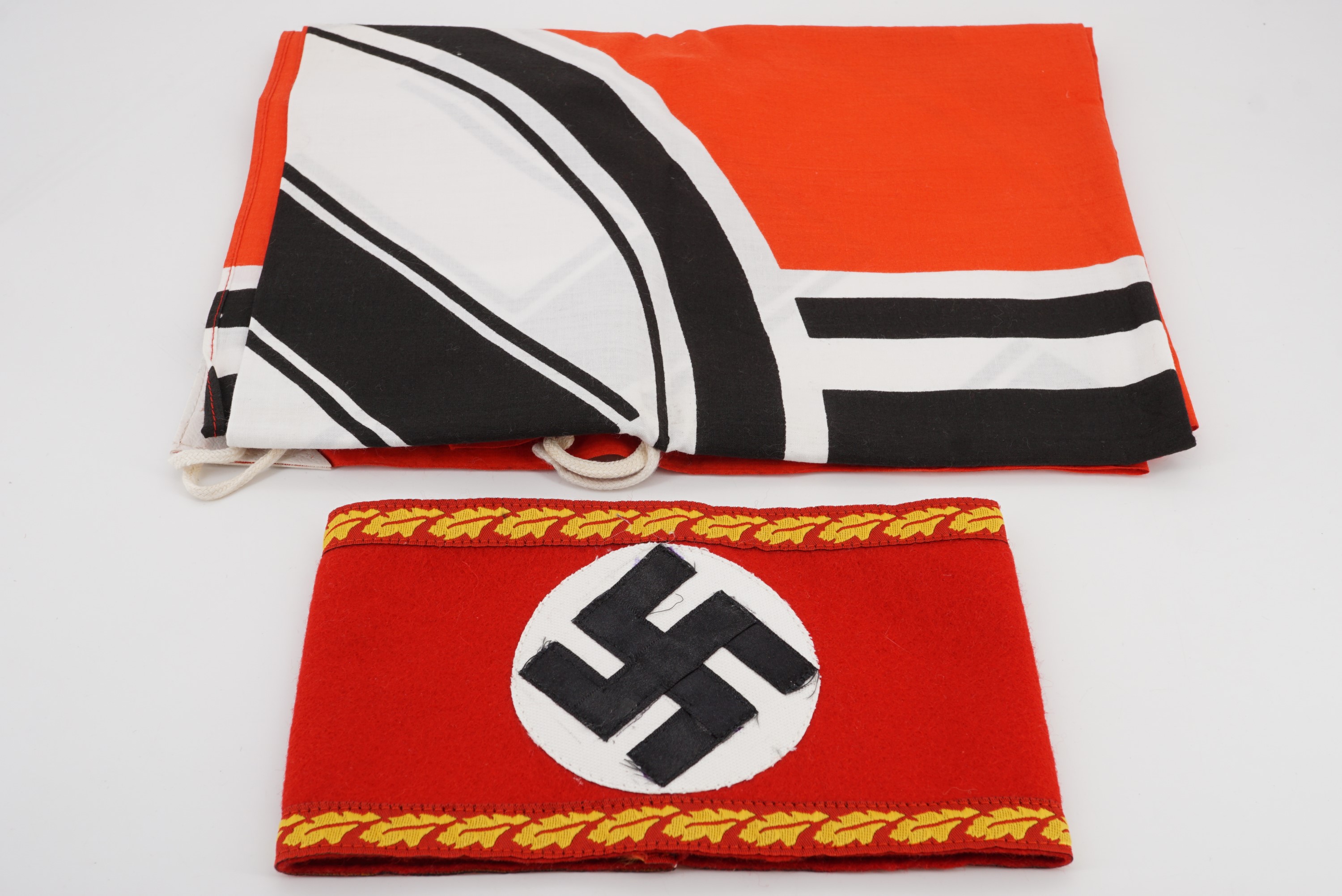 A reproduction German Third Reich flag and arm band