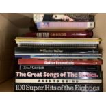 A large quantity of books on guitars, guitar music, guitar chords etc