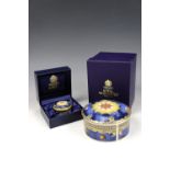A boxed Royal Worcester millennium commemorative box together with a smaller the same, tallest 6 cm