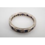 A vintage sapphire and white stone eternity ring, stamped 9 ct, Q, 2.8 g