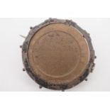 A Great War munitions worker's coin brooch