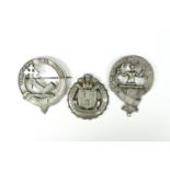Two clan plaid brooches together with a brooch commemorating the visit of the Prince of Wales to