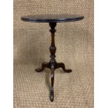 A quality older reproduction cross-banded mahogany tripod wine / lamp table, 35 cm x 50 cm