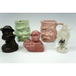 A collection of Great War Bruce Bairnsfather / Old Bill character mugs, a crested china figurine,