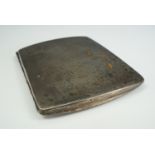 A 1930s silver cigarette case, cushion shaped and decorated with lattice pattern engine turning, 8.5