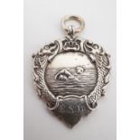 An early 20th Century silver swimming prize fob medallion