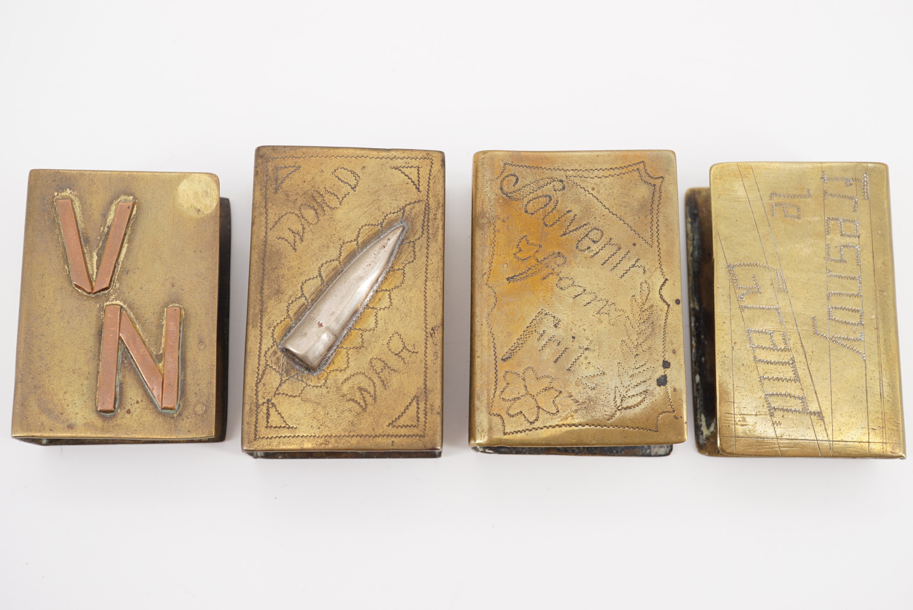 Four Great War hand-engraved brass trench art matchbox covers