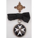 An St John Ambulance Brigade Order of St John Officers Serving Brother breast badge, together with a