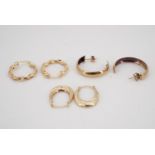 Three pairs of yellow metal hoop earrings, 4.3 g