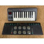 A Yamaha DD-10 miniature keyboard together with a Yamaha synth