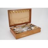 A jewellery box containing a quantity of vintage and contemporary costume jewellery