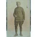 A Great War tinted photographic portrait of a Royal Flying Corps airman, in a mirrored frame, 40