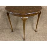 A walnut demi-lune hall table, circa 1930s, 75 cm x 72 cm