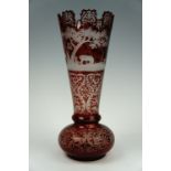 A late 19th century Bohemian ruby flashed and finely wheel cut glass vase, (a/f), 31 cm