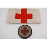 A Great War Army medical Service red cross brassard together with an arm badge