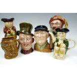 Two Beswick character jugs, Falstaff and Micawber, a Royal Doulton golfer character jug, two
